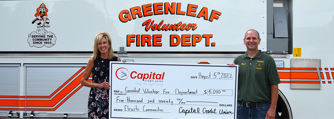 Capital Credit Union CEO Laurie Butz presents check donation to Greenleaf Volunteer Fire Department