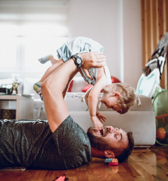 father playing with child