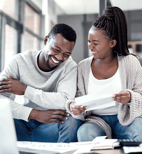 Couple looking at student loan refinancing options.