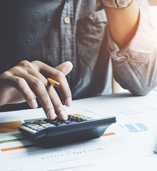 Man using calculator. 