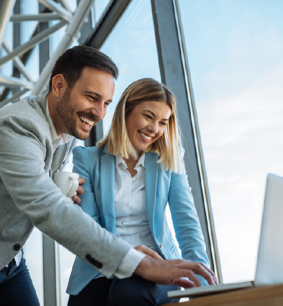 business partners using laptop