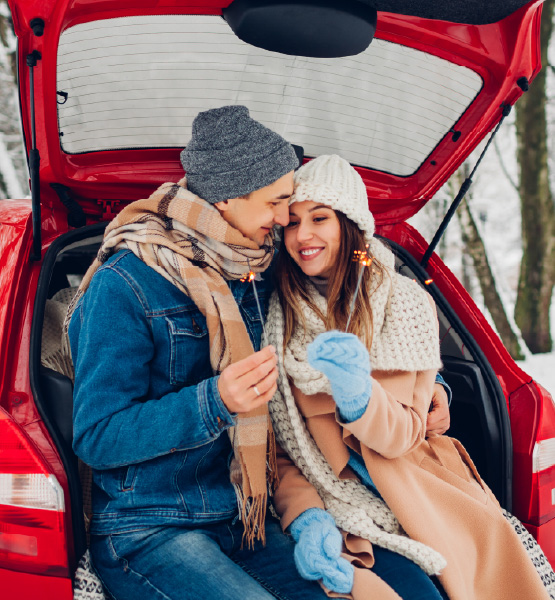 enjoying the snow outside new car