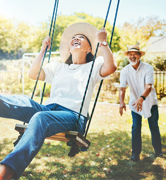 happy retired couple enjoying the outdoors. 