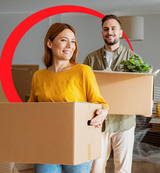 Happy couple moving into their new home.