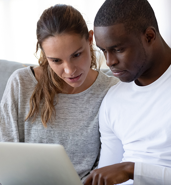 Couple on laptop.