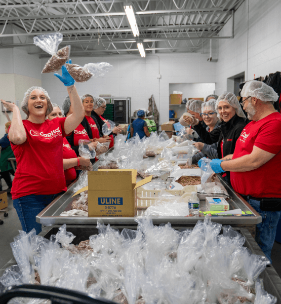 Capital CU employees volunteering at Paul's Pantry.