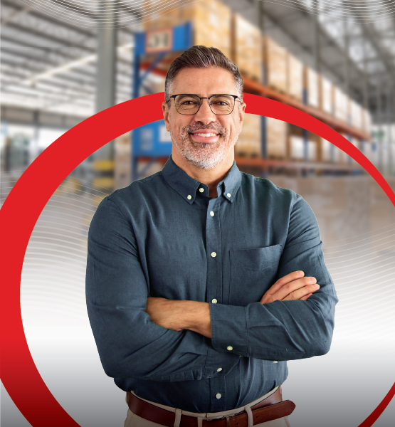 Business man in warehouse.