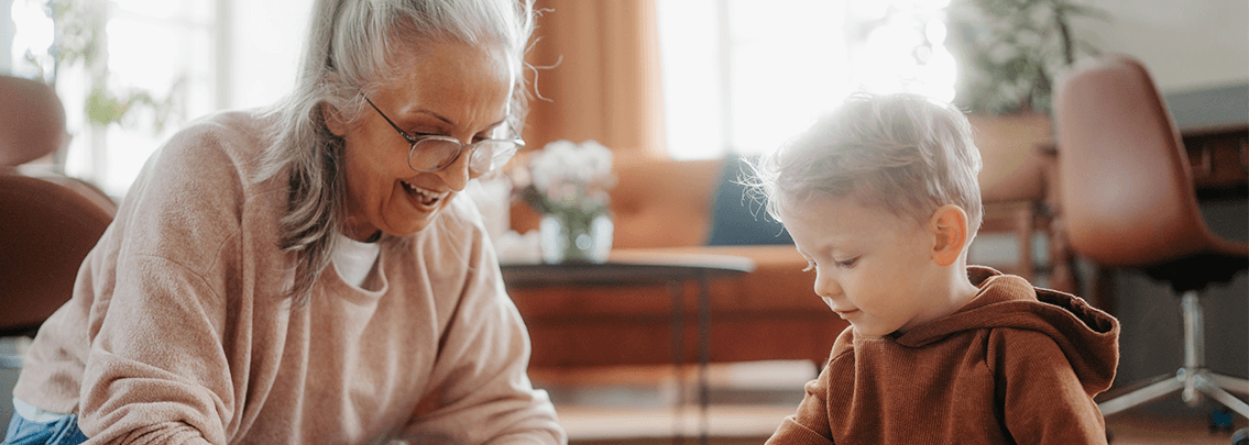 Elder lady playing with grandchild.